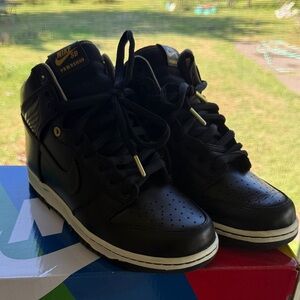 Nike SB Black and Gold High-Top Sneakers